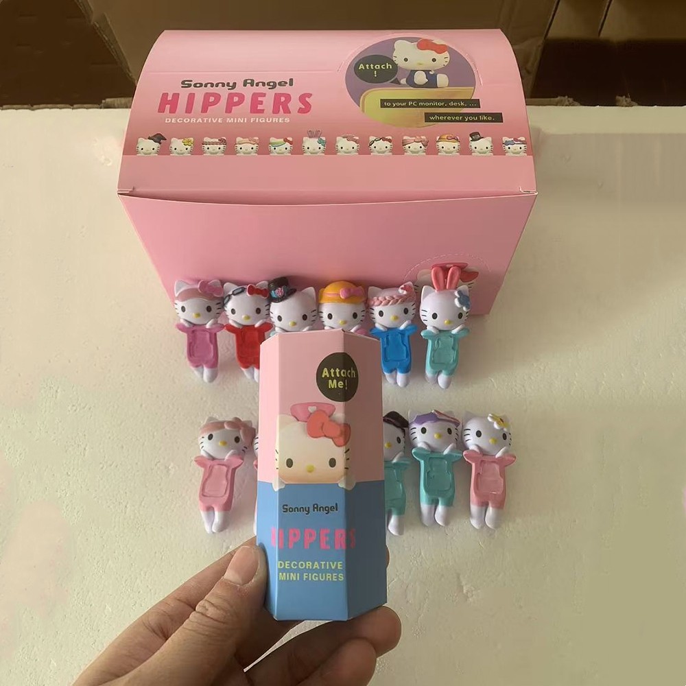 1 ชิ้นสุ่ม Hello KITTY HIPPERS series สามารถติดกาวเพื่อวัตถุในชีวิตประจําวัน อุปกรณ์เสริมโทรศัพท์มือถือน่ารัก