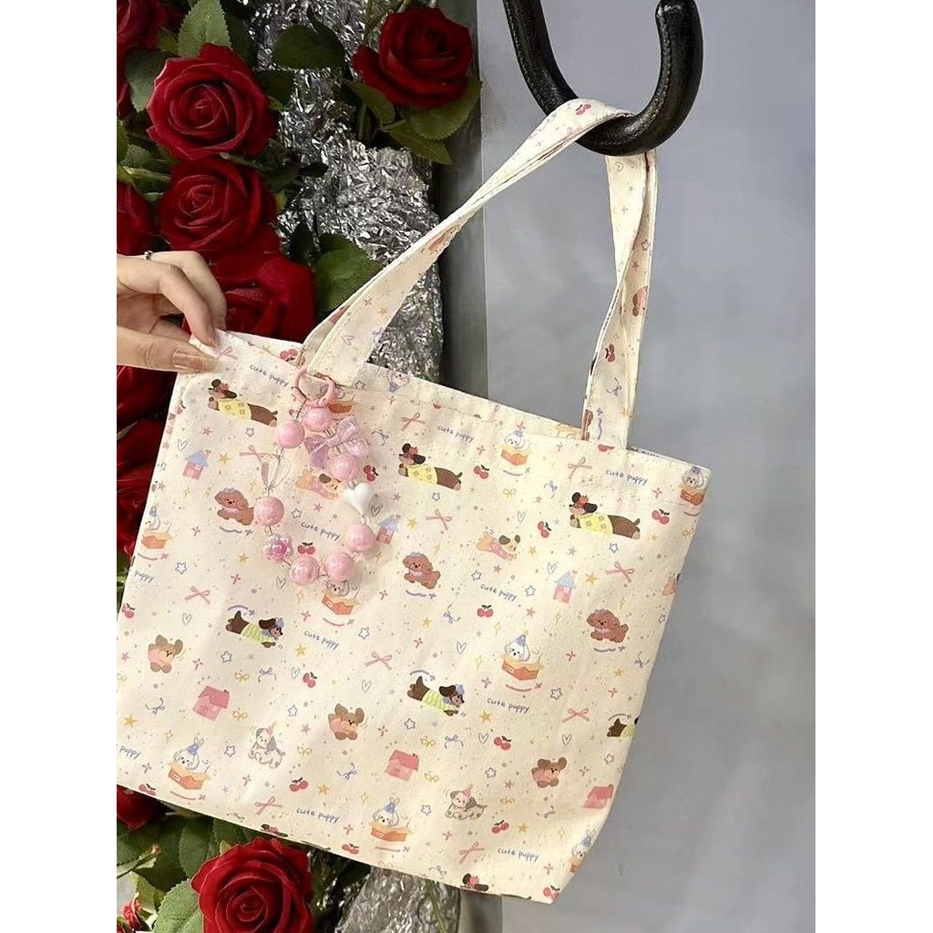 ใหม่ Hello Kitty ดูดีพร็อพ niche COMMUTER's All-Matching Canvas BAG
