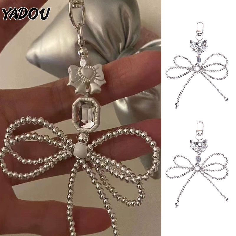 Yadou เกาหลี ins เงินลูกปัดโบว์ออกแบบแฟชั่นกระเป๋าเฉพาะจี้