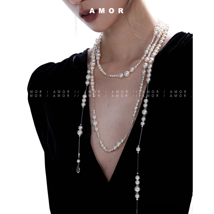 สร้อยคอมุกยาวซ้อนด้วยโซ่ท้องฟ้าเต็มไปด้วยดวงดาววินเทจ