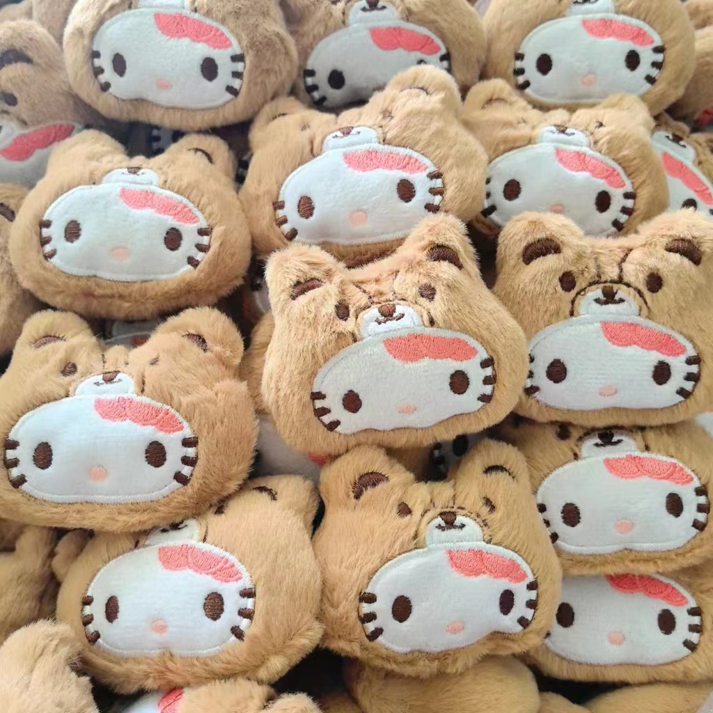 กาแฟหมีคิตตี้น่ารักตุ๊กตาจี้สาวหูฟังการจัดเก็บนักเรียนใหม่กระเป๋าเปลี่ยนจี้