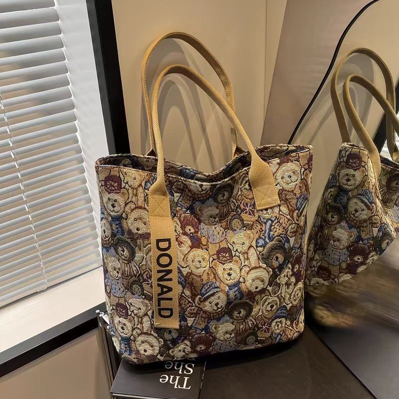 การ์ตูนการ์ตูนหมีผ้าใบกระเป๋าหญิงสไตล์ใหม่สบายๆขนาดใหญ่-ความจุ สิริ กระเป๋า ระดับ ผู้เดินทาง สิริ กระเป๋า