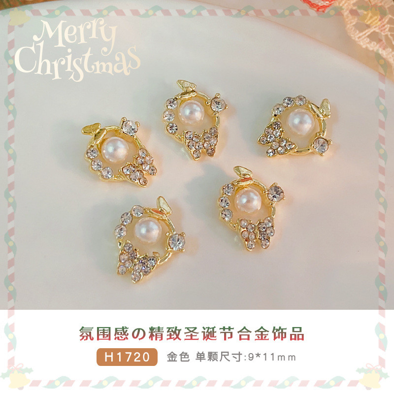 รูปแบบใหม่คริสต์มาสพวงมาลัยเครื่องประดับโลหะผสมโบว์เล็บมุกผลิตภัณฑ์สําเร็จรูปเพชรสวมใส่อุปกรณ์เล็บ - รูปที่ 4