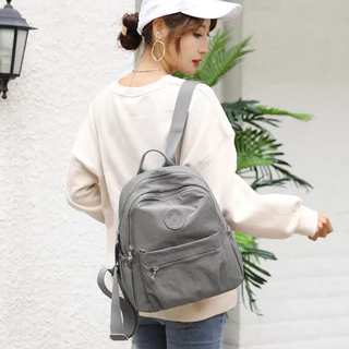 แฟชั่นผู้หญิงใหม่กระเป๋าเป้สะพายหลังไนลอน Candy สีทึบอินเทรนด์ Casual อเนกประสงค์ช้อปปิ้ง Mommy Bag