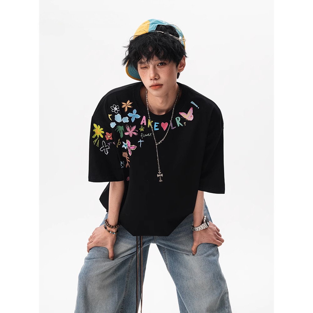 ฤดูร้อนสร้างสรรค์การ์ตูน Graffiti Street Wear Design Feeling All-Match หลวมสบายๆครีมกันแดดสั้น @-
