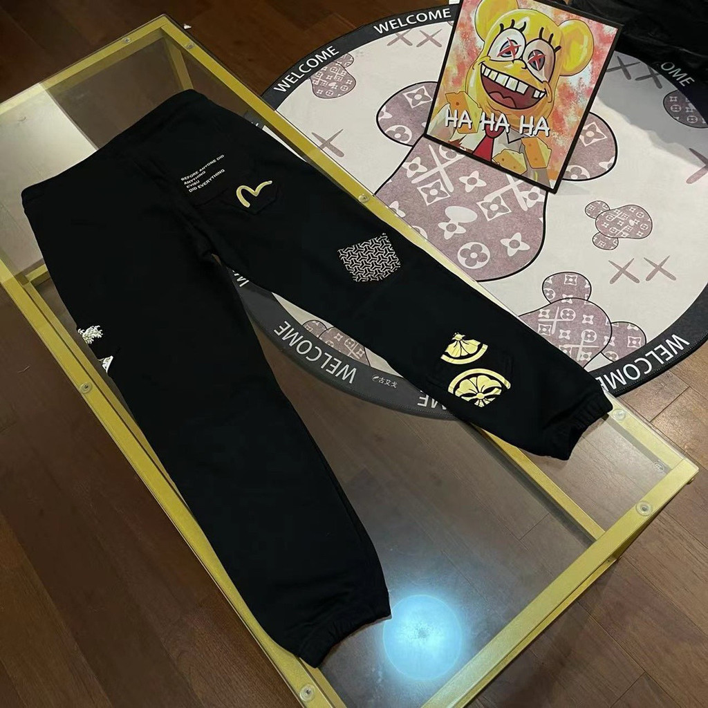 EVISU กางเกงหลวมกางเกงกีฬาผู้ชายพิมพ์ลาย