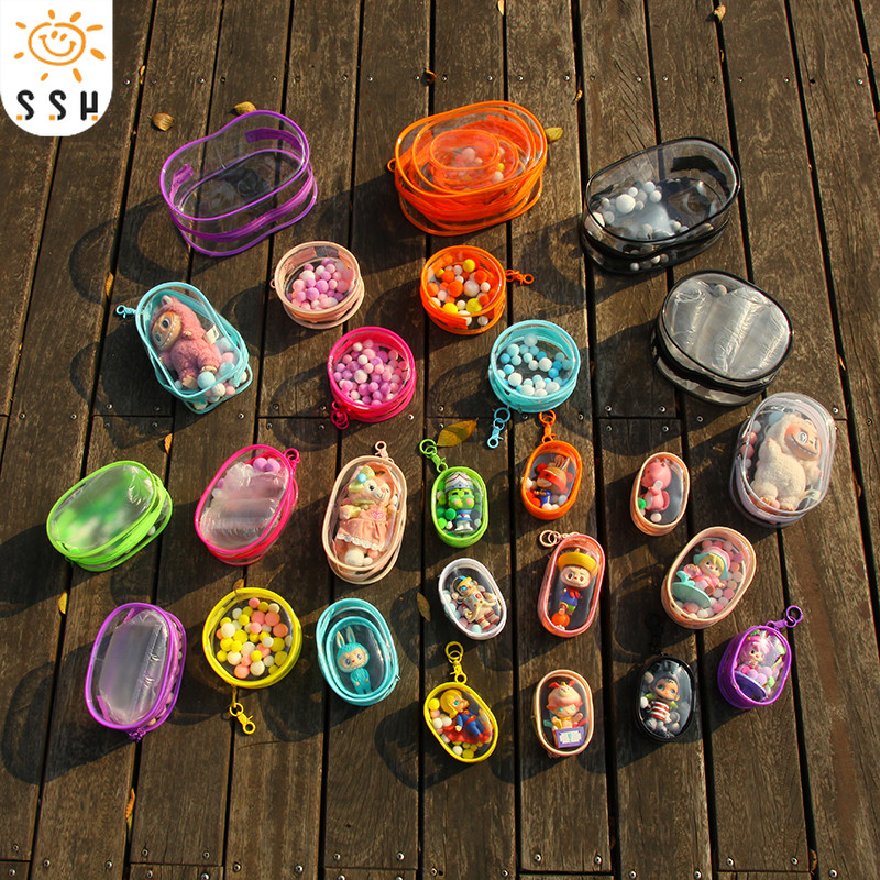 กระเป๋าใส่ลาบูบู้ กระเป๋าตุ๊กตาไวนิล พวงกุญแจ PVC แบบใส หนา กันฝุ่น แฟชั่น มาการอง