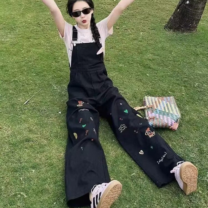 สีดําการ์ตูนพิมพ์ฤดูร้อนเอวสูง ผอมลง ดูขากว้าง ชุดจั๊มสูท