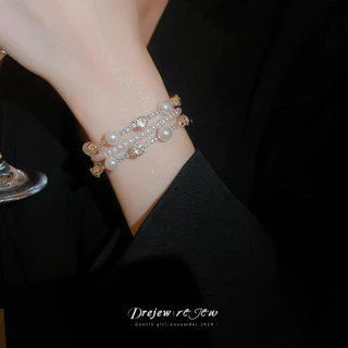 เดรช เพชรฝังมุกหลายชั้นรอบเปิดสร้อยข้อมือศาลฝรั่งเศสสไตล์สร้อยข้อมือแสงหรูหราระดับไฮเอนด์ตกแต่งมือ