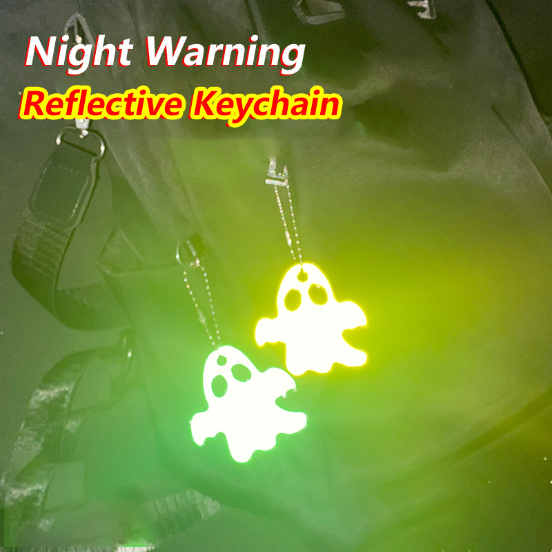 กระเป๋าเป้สะพายหลังฉลากพวงกุญแจสะท้อนแสงผีน่ารักจี้สะท้อนแสงสองด้าน