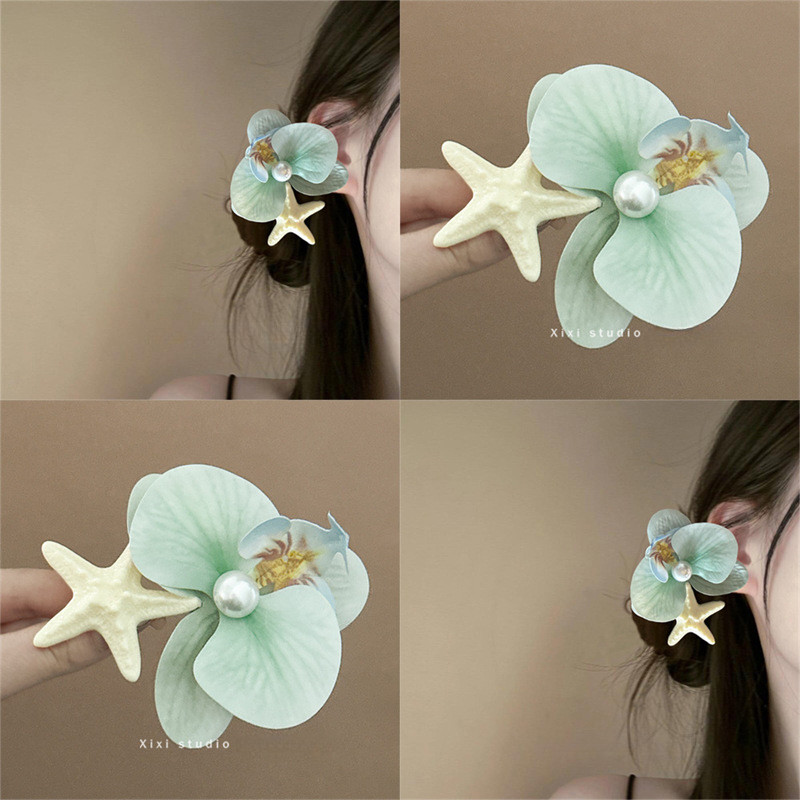 ฟาแลนนอปซิส ปลาดาวกิ๊บหญิง 2025 ฤดูร้อนใหม่ริมทะเลสไตล์วันหยุดเครื่องประดับผมดอกไม้