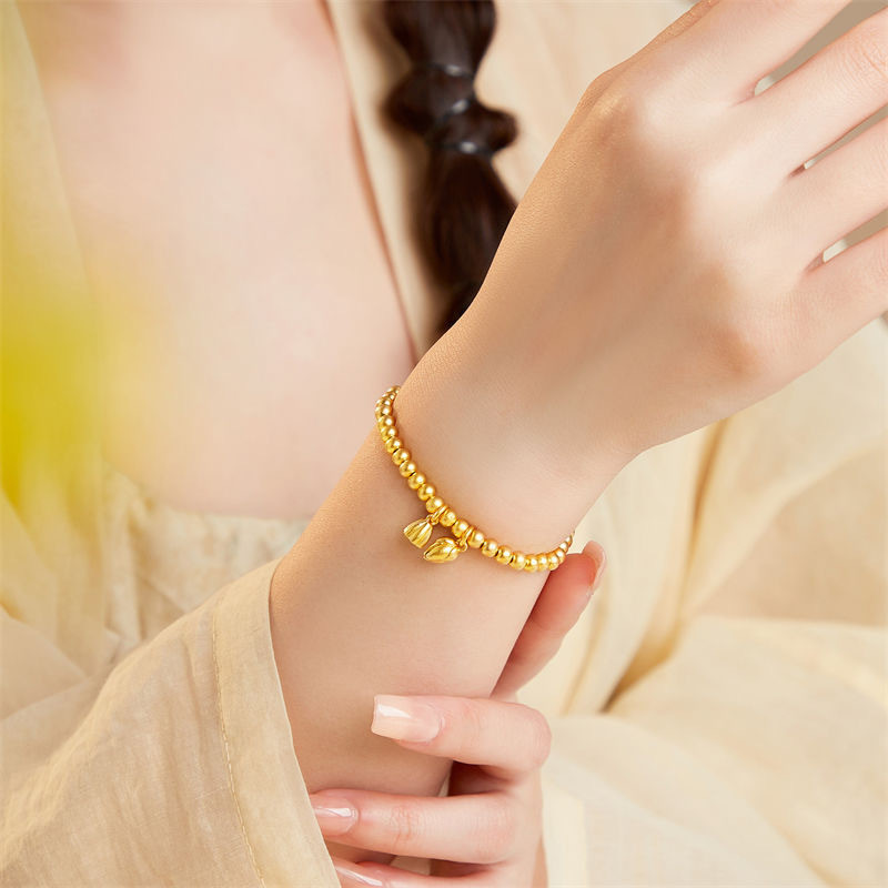 Ht Two Worlds Huan Chain Lotus สร้อยข้อมือเหล็กไทเทเนียมหญิงสไตล์ชาติพันธุ์สแตนเลสสร้อยข้อมือสาวเคลือบทอง