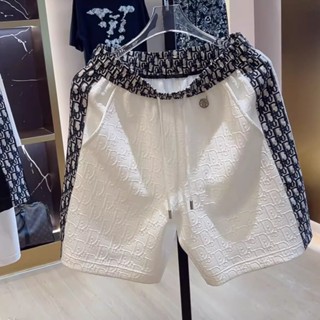 กางเกงขาสั้นผู้ชาย 2025 กางเกงขาสั้นดีไซน์ระดับไฮเอนด์แฟชั่น…