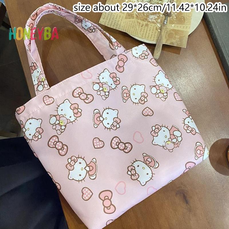 SANRIO <Honeyba>การ์ตูนSanrio Girlyกระเป๋าสะพายน่ารักhello Kitty Toteผ้าใบกระเป๋าขนาดใหญ่ความจุถุงอาหารกลางวันกระเป๋าเดินทางกระเป๋าถือของขวัญNice