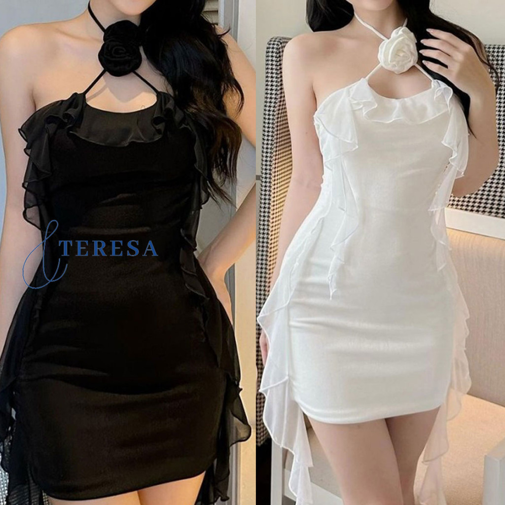 เดรสไม่สมมาตรผูกคอ สีดำ พร้อมชายระบาย ช่วยทำให้ดูเรียบร้อย