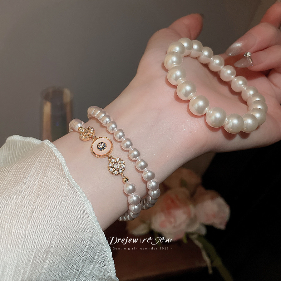 DREW 18k ทองแท้เคลือบด้วยไฟฟ้า zircon สร้อยข้อมือมุกภาษาฝรั่งเศสคํา niche แฟชั่นอเนกประสงค์สร้อยข้อมือหรูหรา high-end เครื่องประดับมือ