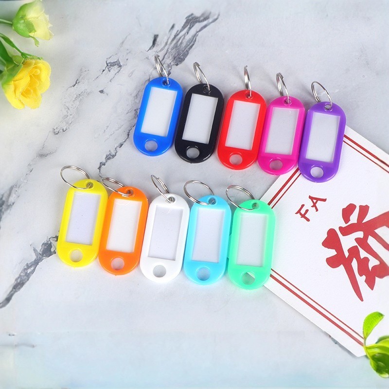 ที่เรียบง่ายที่มีสีสันพลาสติก หน้า แท็กกุญแจกระเป๋าเครื่องหมายแท็กโรงแรมจํานวนการจําแนกแท็กพวงกุญแจ ทําเอง เครื่องประดับอุป