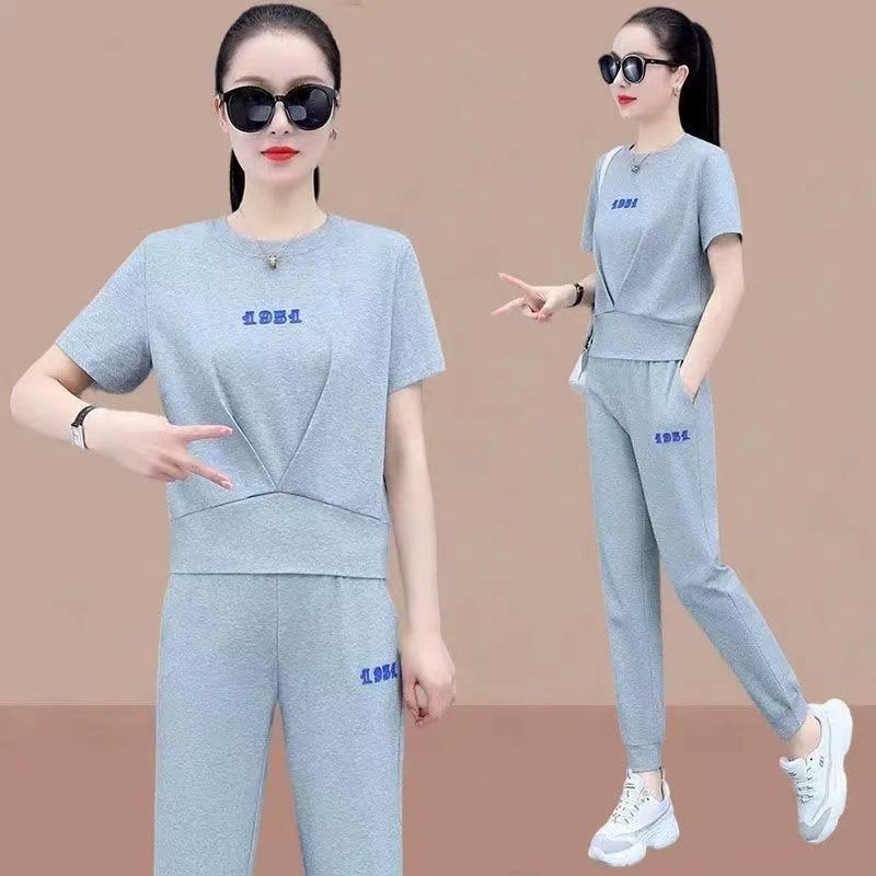 แฟชั่น 2025 ชุดกีฬาสไตล์ใหม่ผู้หญิงฤดูร้อนบางเสื้อกันหนาวผู้หญิงแขนสั้นหลวมสบายๆสไตล์ตะวันตกชุดสองชิ้น