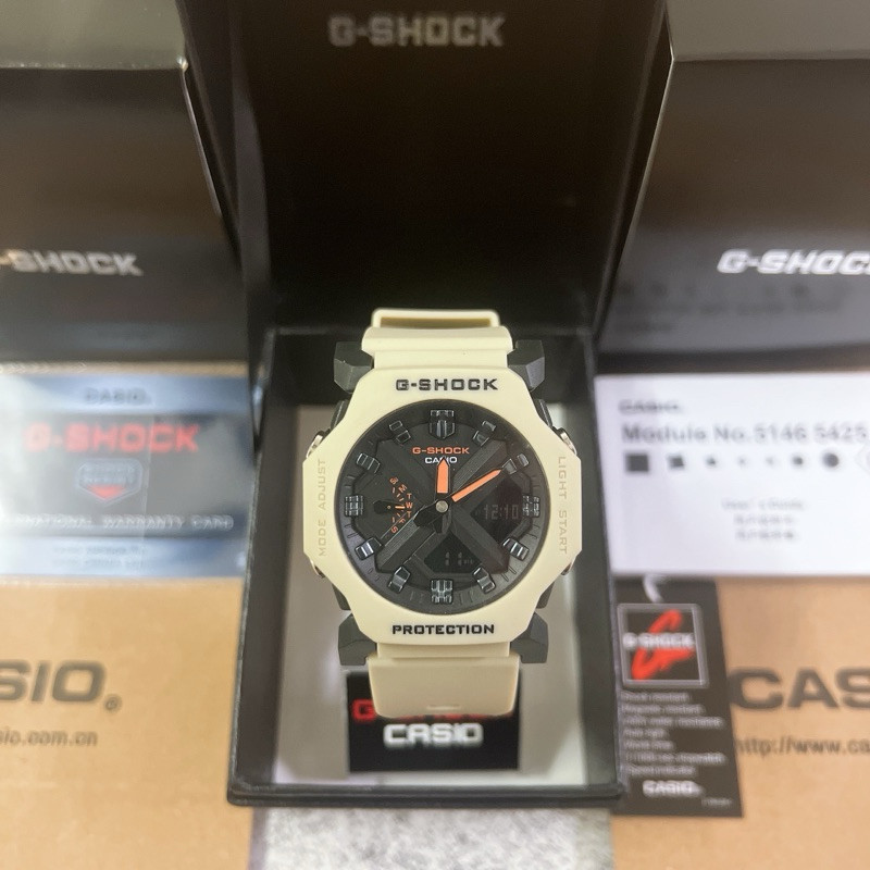 G-shock GA-2300 นาฬิกาสปอร์ตสีส้มสีเบจ นาฬิกาดิจิตอลอะนาล็อก นาฬิกาสปอร์ตกันน้ํา Z567