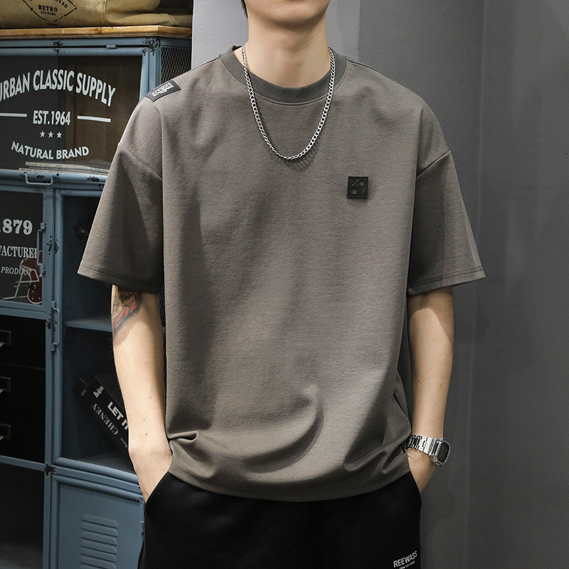 เสื้อผ้าผู้ชายเสื้อทีเชิ้ตแขนสั้นเทนเซลแบบใหม่ฤดูร้อนเสื้อยืดชายเสื้อทีเชิ้ตแขนสั้นทรงหลวมแขนห้าส่วนคอกลมวินเทจสไตล์อเมริกัน