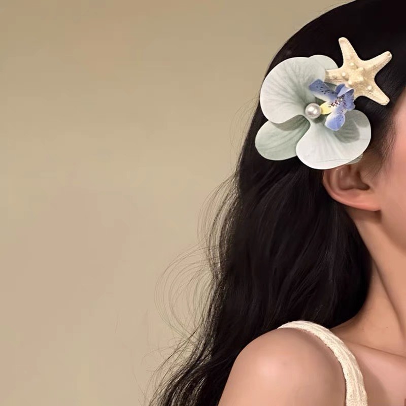 ฟาแลนนอปซิส ปลาดาวกิ๊บหญิง 2025 ฤดูร้อนใหม่ริมทะเลสไตล์วันหยุดเครื่องประดับผมดอกไม้ - รูปที่ 3