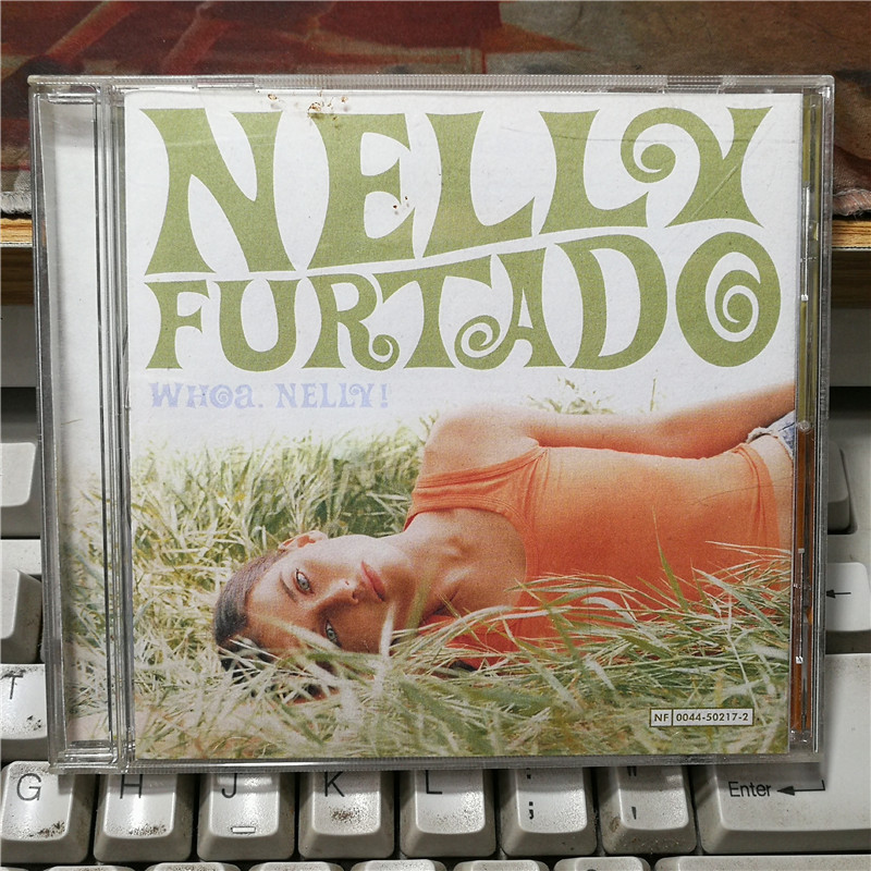 WV8000: Nelly Furtado – Woa, Nelly! [ของสะสม]