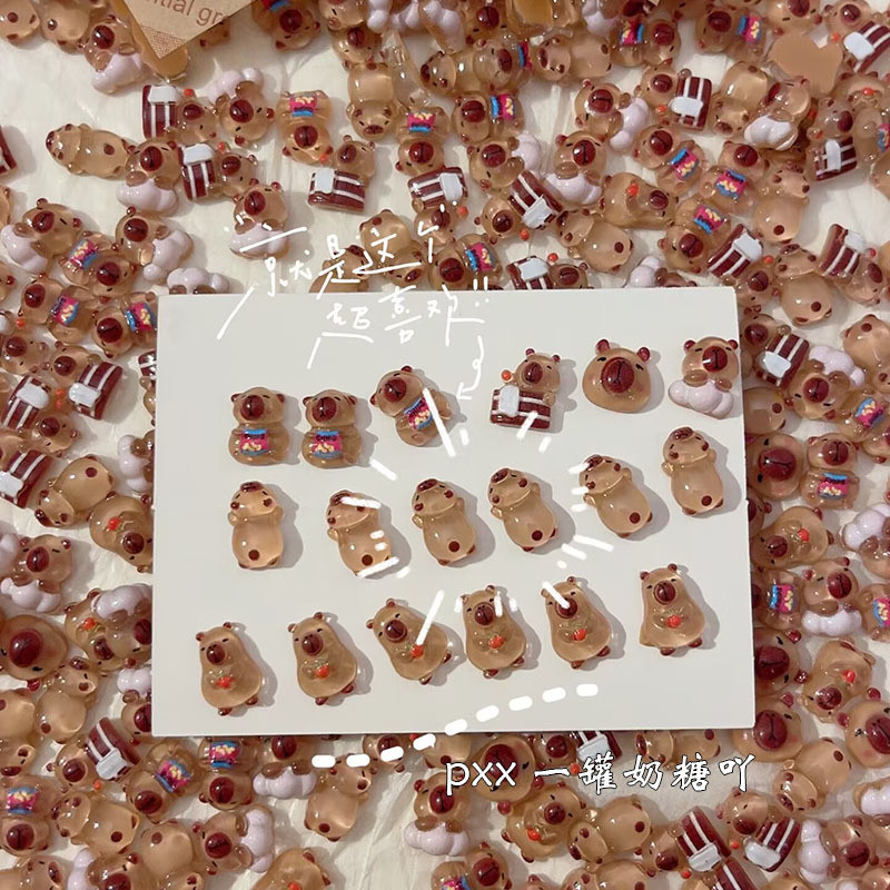 [100ในสต็อกมินิ] ใหม่น่ารัก Kapibala Water Baby อุปกรณ์ทำเล็บที่นิยมในโลกออนไลน์น้ำหนูตะเภา DIY เครื่องประดับหู Guka สร้างสรรค์