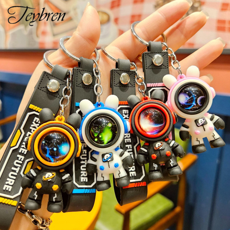 (พร้อมส่ง)พวงกุญแจรถยนต์ดีไซน์เก๋ ลายกระต่ายนักบินอวกาศบนท้องฟ้าเต็มไปด้วยดวงดาว พวงกุญแจห้อยกระเป๋า ของขวัญสำหรับคู่รัก