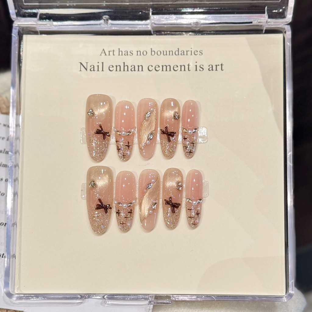 HANDMADE+กาวฟรีArtificial Nail Brown Bow XIAOXIANGFENG Cat-eye Phototherapy แผ่นแปะเล็บปลอมกดบนเล็บนํากลับมาใช้ใหม่ได้