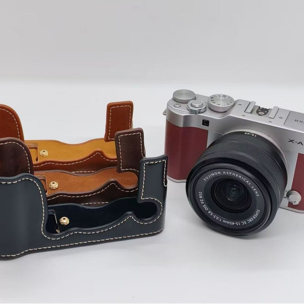 เหมาะสําหรับ Fuji XA3 XA5 เคสกล้อง xa3 เคสหนังครึ่ง xa5 ฐานอุปกรณ์เสริมสําหรับกล้อง