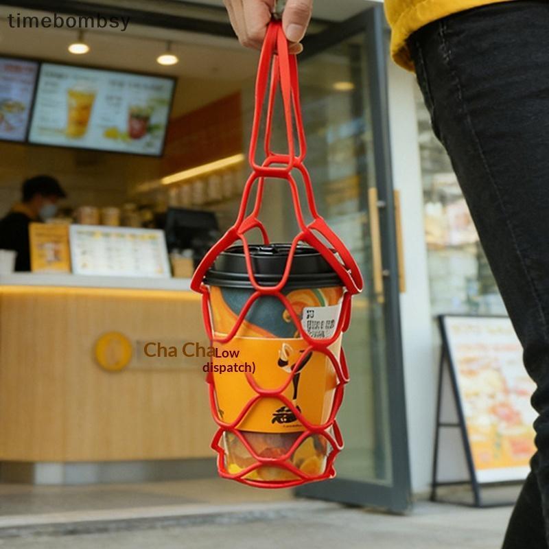 (เวลา) ถุงชานมซิลิโคนกลวงออกถุงกาแฟแบบใช้ซ้ําได้ตกแต่งที่วางเครื่องดื่มน้ําหนักเบาสําหรับสํานักงานและชุมนุม (TH)