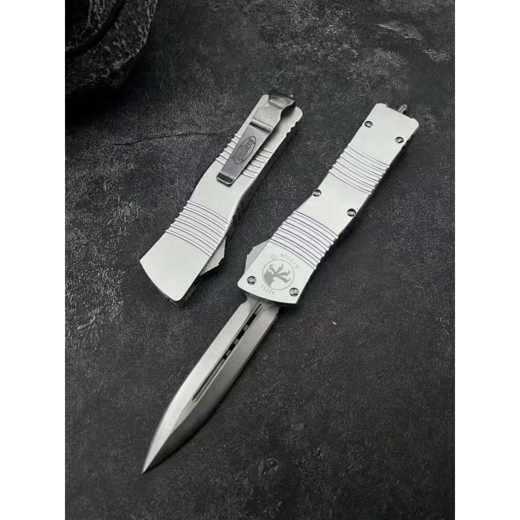 Microtech ไมโครเทคโนโลยี OTF Silver Dalong - วัสดุขอบตัด: D2 - วัสดุของก้าน: อลูมิเนียม ➕ ก้านโปร่งใ