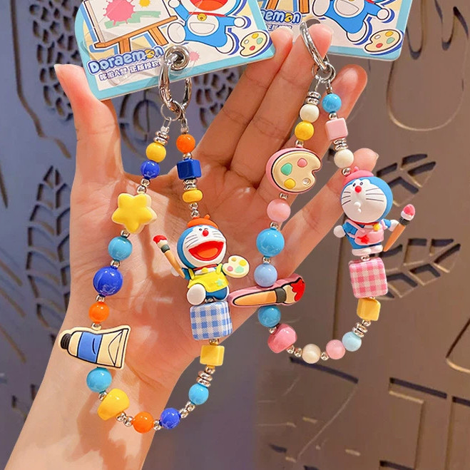 ของแท้โดราเอมอนจิตรกรลูกปัดพวงกุญแจการ์ตูนน่ารักตุ๊กตาโทรศัพท์มือถือโซ่จี้ของขวัญขนาดเล็ก