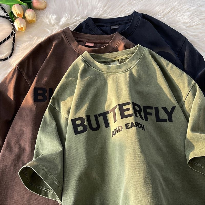 2026时尚 2026American Retro Street Casual เสื้อยืดขนาดใหญ่ชายครึ่งแขนหลวมรอบคอฤดูร้อนนักเรียนหญิงตัวอั