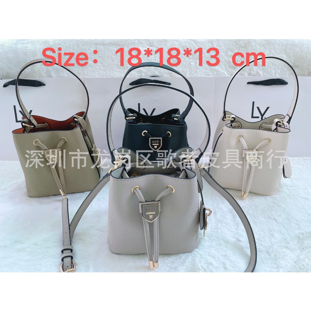 LYN ACCS กระเป๋าสะพายไหล่หญิง 2024 สไตล์ใหม่ สีตัดกันขนาดเล็ก เหมาะสำหรับการใช้งานทุกวัน