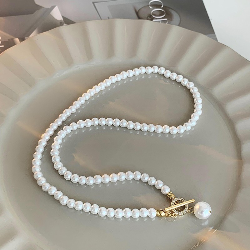 แฟชั่นเลียนแบบมุกเพชรOTหัวเข็มขัดสร้อยคอซอกออกแบบสไตล์เย็นไฮไลท์ที่ดีงามมุกโซ่กระดูกไหปลาร้าหญิง 8แล