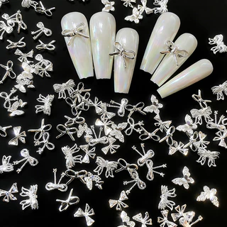 20 ชิ้นประณีตลูกไม้ Bowknot Nail Art Charms โลหะผสมทองเงินผีเสื้อตกแต่งเล็บ Rhinestones DIY