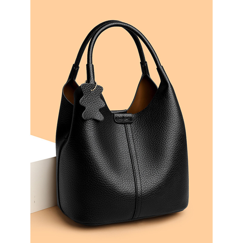 หนังนุ่มหญิงกระเป๋าสะพายไหล่ Messenger กระเป๋าแฟชั่น All-Match High-End Niche Design แบบพกพา
