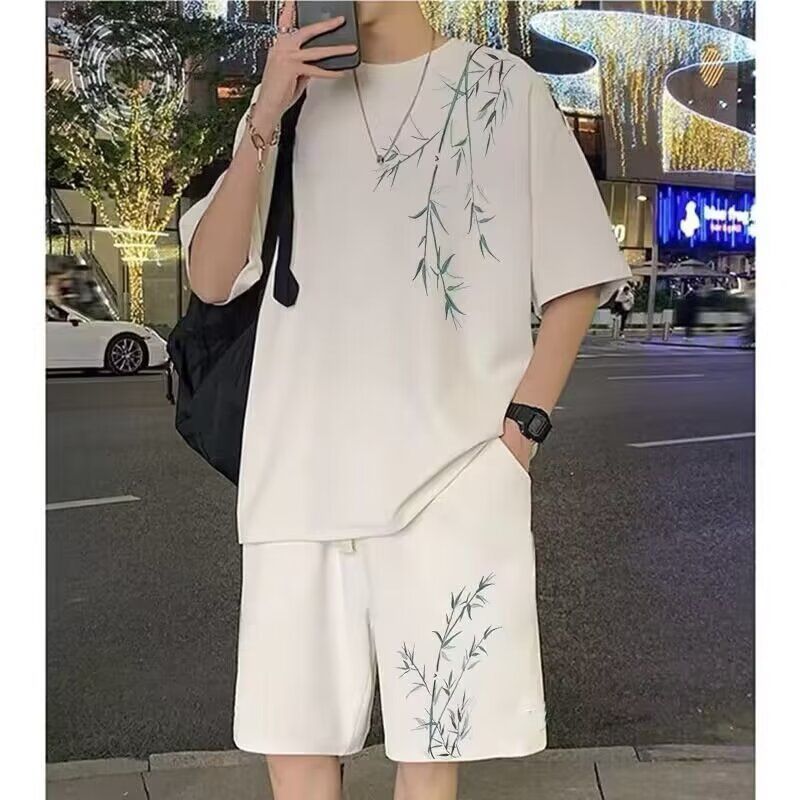 แห่งชาติอินเทรนด์ใหม่สไตล์จีนใบไม้ไผ่ขนาดบวกสูทผู้ชายฤดูร้อนหลวมสบายๆกีฬากางเกงขาสั้นแขนสั้นเสื้อยืดชุดสองชิ้น