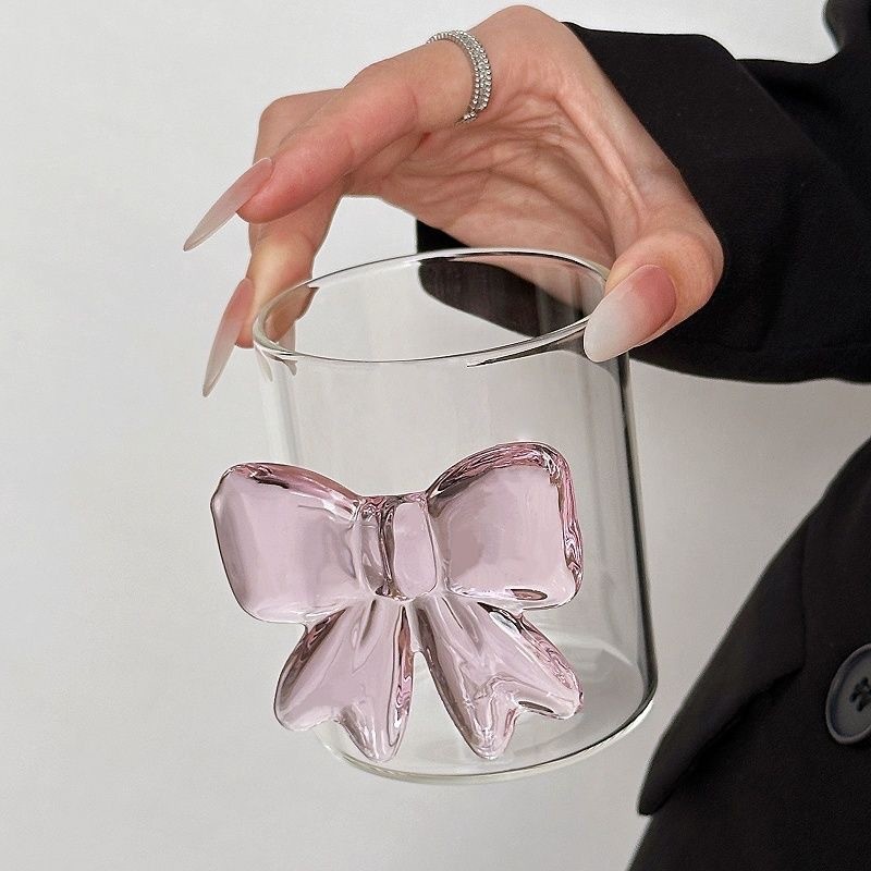 Ins สามมิติโบว์สีชมพูนูนโปร่งใสตรงแก้วน้ําถ้วยถ้วยนม Borosilicate สูงทนความร้อน Niche Design