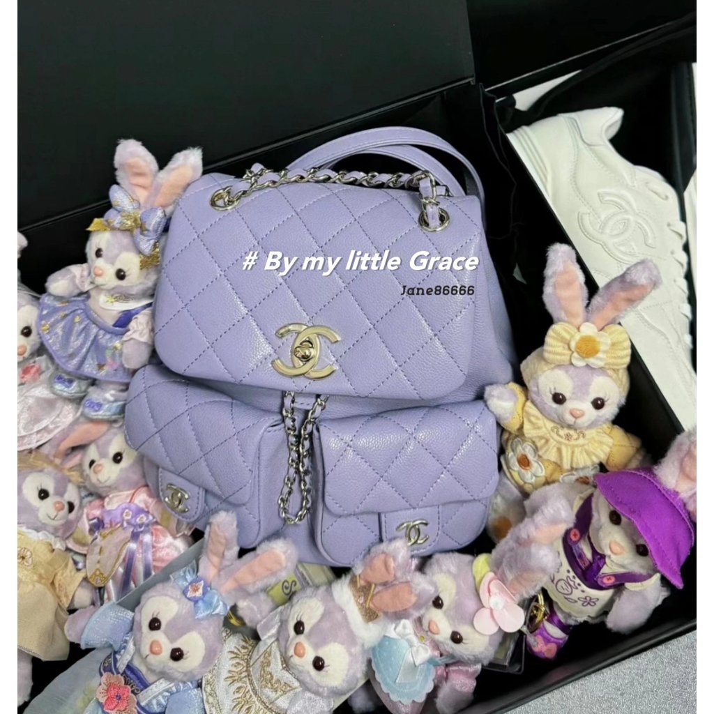 กระเป๋ากบสีม่วงและกระเป๋าเป้สะพายหลัง CHANEL KiraX พร้อมสายโซ่