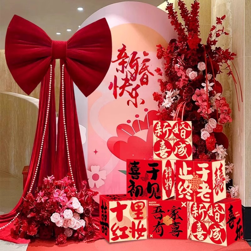 ตกแต่งงานแต่งงานขนาดใหญ่กํามะหยี่สีแดงโบว์เครื่องประดับจัดงานแต่งงานฉากจัดเลี้ยงตกแต่งคู่มือถนนตกแต่