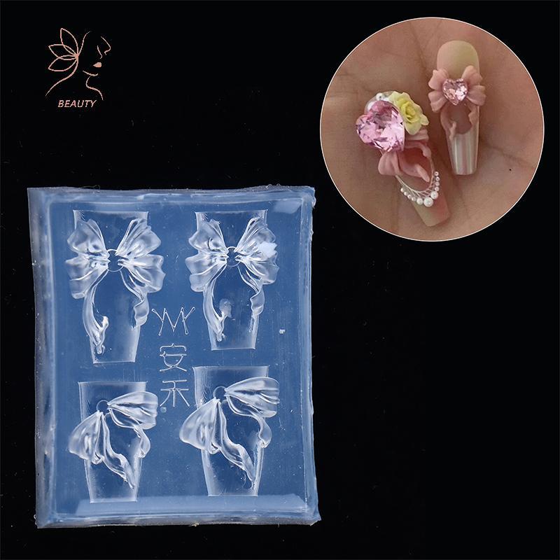 [maybeauty] 3D ริบบิ้น Bowknot รูปเล็บแม่พิมพ์ปั๊มลายฉลุสําหรับ UV Gel Polish Art ซิลิโคนแกะสลักออกแบบ DIY Charm ตกแต่ง {TH}