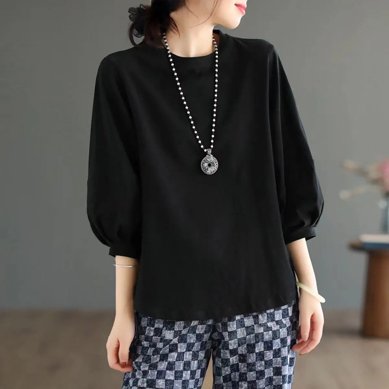 【หนึ่งตัวใส่ได้ร้อยสไตล์!】เสื้อยืดแขนสามส่วนสีดำ basic ใส่กับกางเกงยีนส์ กระโปรงยาว หรือกางเกงขากว้างก็ลงตัว สำหรับคนรักแฟชั่น minimal