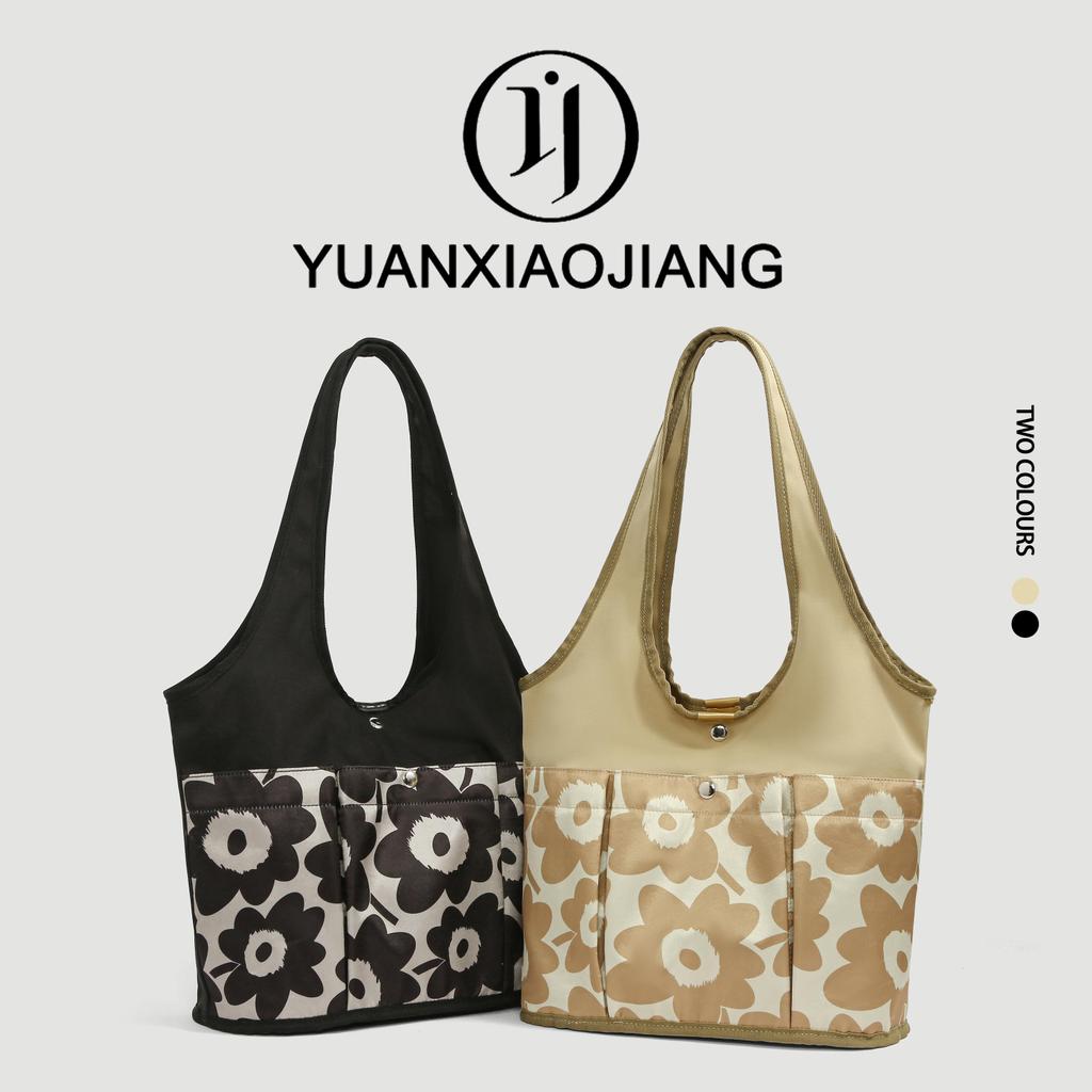 YUANXIAOJIANG มาใหม่ขายดี กระเป๋าสะพายไหล่ ลายดอกมินิมอล วัสดุไนลอนกันน้ำ ความจุใหญ่ สีใหม่แมทช์ง่าย
