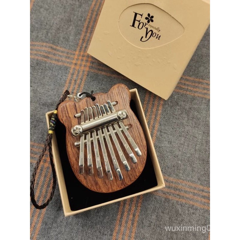 มินิแบบพกพาน่ารัก Influencer Thumb Piano Carlimba Thumb Piano เปียโนนิ้วหัวแม่มือขนาดปาล์ม 8-tone TZ