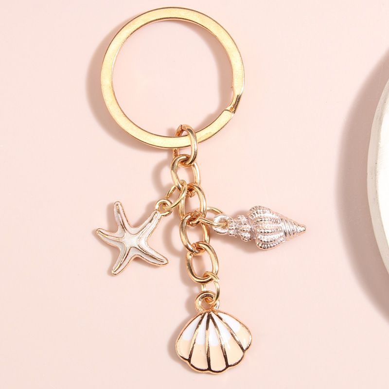 Hot-selling creative keychain pendants5ya Starfish Collection of Oil-Dripping Pearls1114New fashion 