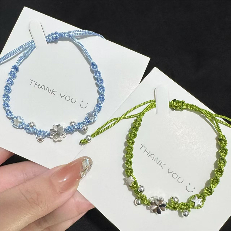 ใหม่ดาวสี่ใบโคลเวอร์สร้อยข้อมือแฮนด์เมดมือเชือกทอผ้าสร้อยข้อมือที่น่าตื่นใจสําหรับเพื่อนคู่สร้อยข้อมิตรภาพ