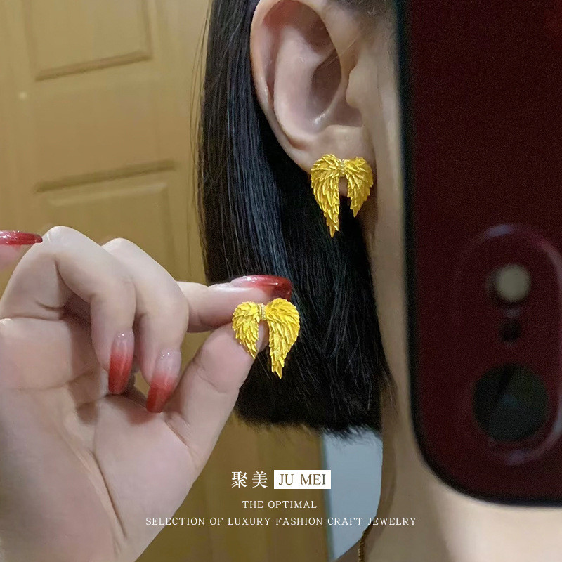 จีน Retro Gold Wing ต่างหู Sand Shop Sand Gold Messenger Wing ต่างหู 12.29