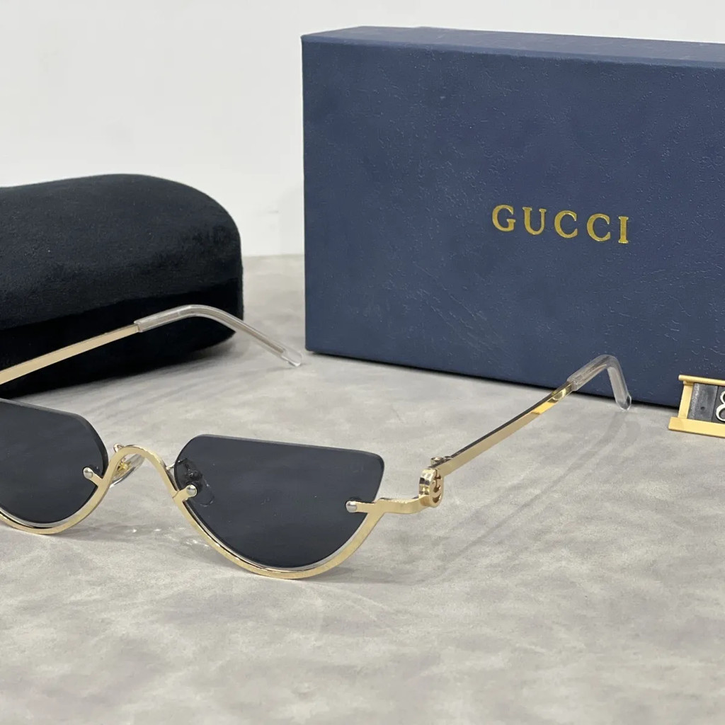 GUCCI7022 แว่นกันแดดสไตล์ใหม่ Feel Street Shooting Influencer แว่นตา Cat Eye